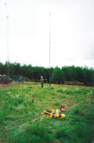 TSgt Thompson putting up HF antenna, Rainier Relay, June 2001