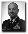 Click for Biography of Col Hallmark